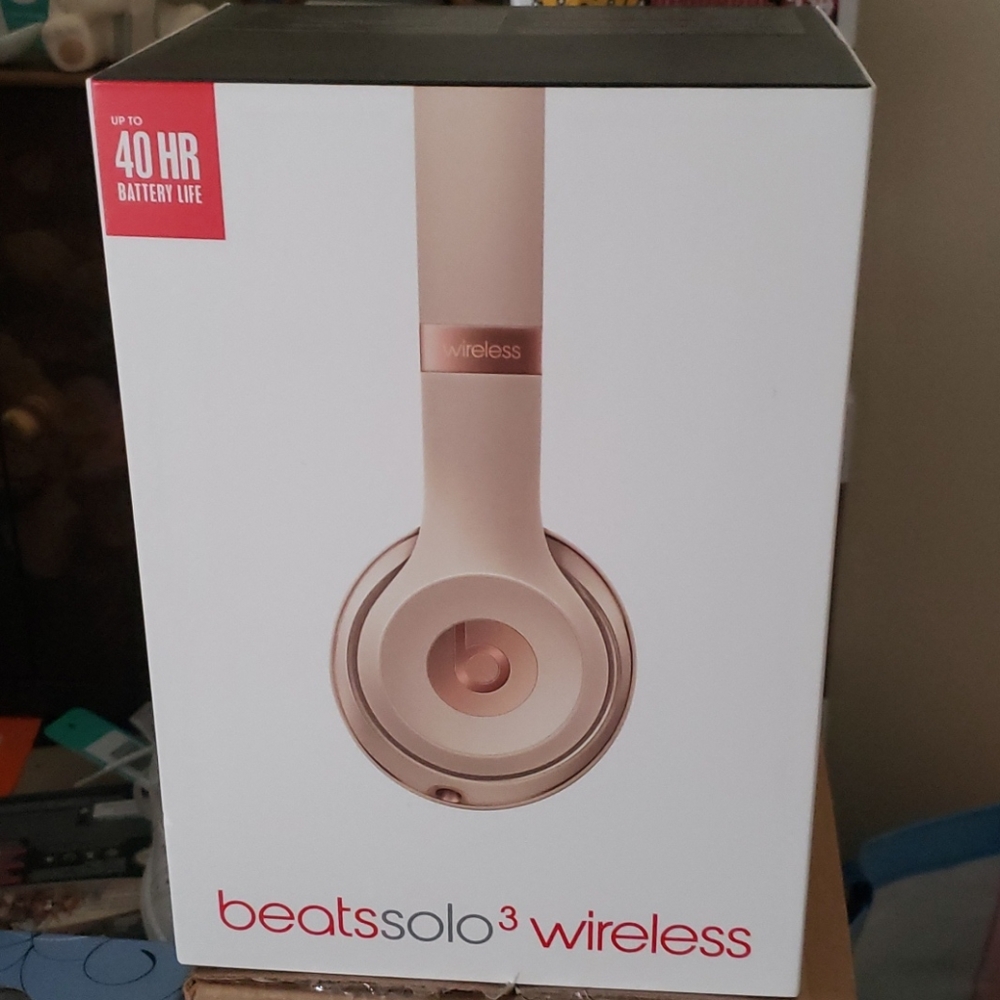 Beats rose gold ear phones
